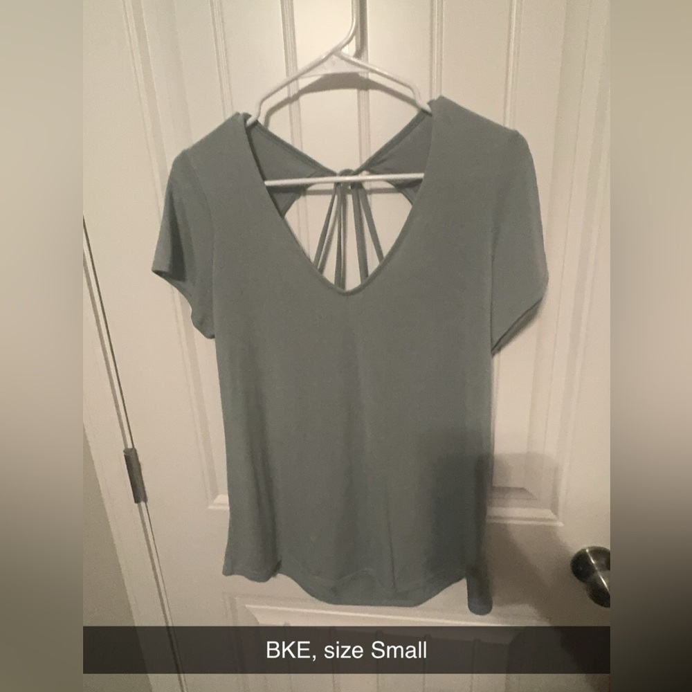 BKE top, cute detailing in the back! See pics. Never worn